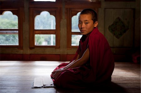 Jakar, Bhutan. Monks at the Jakar Dzong in Bhutan Stock Photo - Rights-Managed, Code: 862-03710580