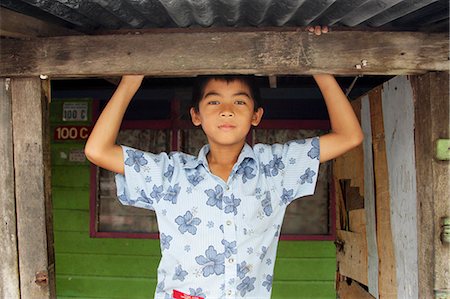 Portrait of boy in Kampung Ayer stilt village, Bandar Seri Begawan, Brunei Darussalam Foto de stock - Con derechos protegidos, Código: 862-03710611