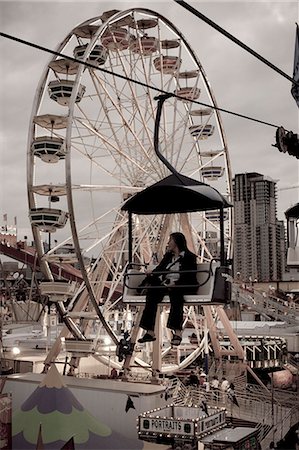 fair wheel - Scene from the midway of the Calgary Stampede in Calgary, Alberta, Canada Stock Photo - Rights-Managed, Code: 862-03710671