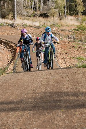 Family cycling along the Lakeside Way, Kielder Water & Forest Park, Northumberland, England. Stock Photo - Rights-Managed, Code: 862-03711000