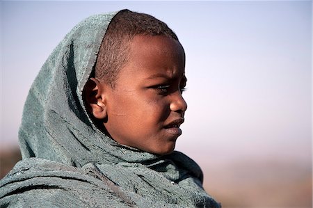 Ethiopia, Lalibela. A young boy with his Sunday shawl. Foto de stock - Con derechos protegidos, Código: 862-03711140