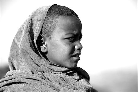 Ethiopia, Lalibela. A young boy with his Sunday shawl. Foto de stock - Con derechos protegidos, Código: 862-03711141
