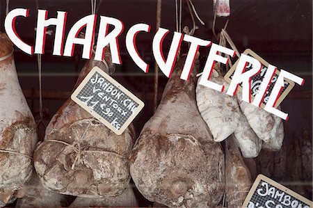 display of supermarket meat - Provence, France. A charcuterie or butchers shop window in Sault France Stock Photo - Rights-Managed, Code: 862-03711341