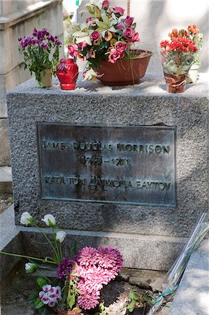 rock tomb - Paris, France. Jim Morrison's grave in the Pere Lachaise cemetery in Paris France Stock Photo - Rights-Managed, Code: 862-03711432