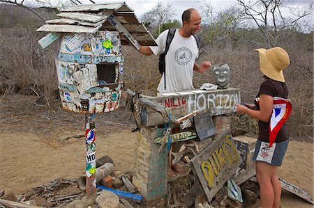 simsearch:862-03711550,k - Galapagos Islands, The Floreana post office. Letters are posted without stamps, other visitors send them on. Foto de stock - Con derechos protegidos, Código: 862-03711532