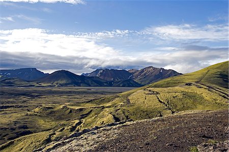 Iceland. The interior of southern Iceland is characterised by low lying,heavily eroded mountains of volcanic origin. Stock Photo - Rights-Managed, Code: 862-03711803