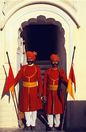 retainer - Ceremonial guards lend colour,if not authenticity,to the ambience of Castle Mandawa,one of the region's best known hotels. Stock Photo - Rights-Managed, Code: 862-03711893