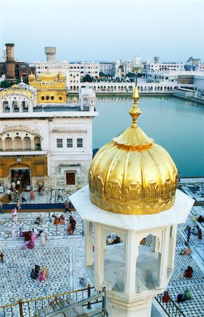 simsearch:400-07990369,k - A view of the Darshani Deorh,the ornate gateway to the causeway leading to the Harmandir,the holiest place in the Sikh Golden Temple. Stock Photo - Rights-Managed, Code: 862-03711900