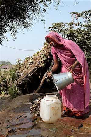 pouring water from bucket