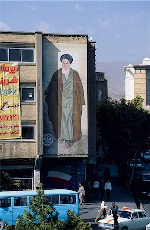 schlau - Modern mural of mullah looks down on a street in Tabriz. Stock Photo - Rights-Managed, Code: 862-03712118