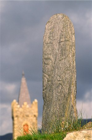 Ireland,Co. Donegal. Church of Ireland and standing stone,Glencolmbkille. Stock Photo - Rights-Managed, Code: 862-03712133