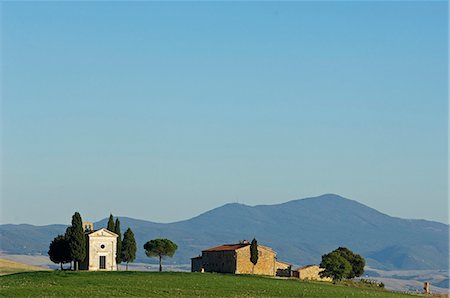 Italy,Tuscany,Val d'Orcia. Chapel of Vitaleta and farmhouse. Stock Photo - Rights-Managed, Code: 862-03712340
