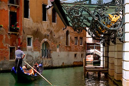 Italy, Veneto, Venice; A gondola on a canal named after the great soprano, Calle Maria Callas, Teatro La Fenice theatre. Stock Photo - Rights-Managed, Code: 862-03712385