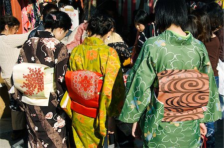 Japan,Honshu Island,Kyoto Prefecture,Kyoto City. Young women wearing Kimonos at a monthly flea market at Toji Temple. Stock Photo - Rights-Managed, Code: 862-03712559