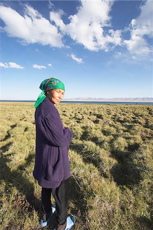 Nomadic woman standing next to Song Kul, Kyrgyzstan Stock Photo - Rights-Managed, Code: 862-03712625