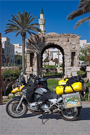 Libya, Tripoli. BMW motorbike in front of the Roman arch of Marcus Aureliuse. Stock Photo - Rights-Managed, Code: 862-03712747