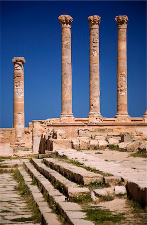 Libya, Tripolitania, Sabrahta; Columns against a blue sky in the Roman city of Sabrahta. Stock Photo - Rights-Managed, Code: 862-03712763