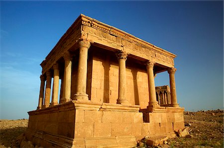 Libya; Tripolitania; Ghirza; The colonnaded stone mausolea, lying in the middle of nowhere in the Bani Walid desert Stock Photo - Rights-Managed, Code: 862-03712777