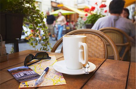 pilies gatve - Lithuania, Vilnius, Coffee And Map At Cafe On Pilies Gatve Stock Photo - Rights-Managed, Code: 862-03712788