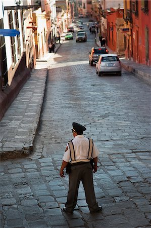 directing traffic - A policeman directing traffic on a street in San Miguel, Mexico Stock Photo - Rights-Managed, Code: 862-03712887