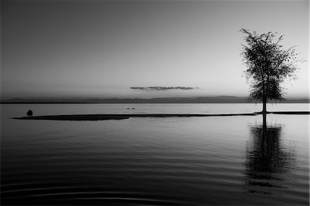 Malawi, Lake  Malawi - stunning sunset over a tranquil Lake Malawi, the perfect place for sundowners. Foto de stock - Con derechos protegidos, Código: 862-03713014