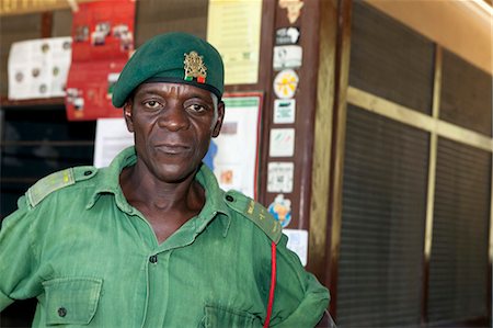 park ranger - Malawi, Upper Shire Valley, Liwonde National Park. A national park warden guards the entrance. Stock Photo - Rights-Managed, Code: 862-03713052