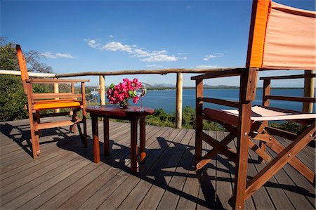 simsearch:862-03361158,k - Malawi, Lake Malawi, Robin Pope's Pumulani Lodge. The view from a luxury villa overlooking Lake Malawi. Fotografie stock - Rights-Managed, Codice: 862-03713068