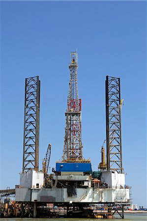 rig oil picture - Africa, Namibia, Skeleton Coast, Walvis Bay. An oil derrick is tied up alongisde in the Walvis Bay Port. Stock Photo - Rights-Managed, Code: 862-03713121