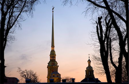 st paul cathedral sunset - Russia, St.Petersburg; The pointed bell tower on the St.Peter's and St.Paul's Cathedral on the Fort dedicated to the saints. Stock Photo - Rights-Managed, Code: 862-03713268