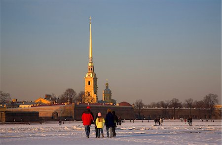 family and church - Russia, St.Petersburg; A family walking on the frozen Neva River heading to Peter and Paul Fortress Stock Photo - Rights-Managed, Code: 862-03713262