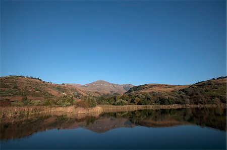 simsearch:862-03808741,k - South Africa, KwaZulu Natal, Central uKahlamba Drakensberg mountain range. Early morning light marks the beginning of a new day. Foto de stock - Direito Controlado, Número: 862-03713364