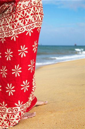 Woman standing on beach, Negombo, Sri Lank. Fotografie stock - Rights-Managed, Codice: 862-03713584