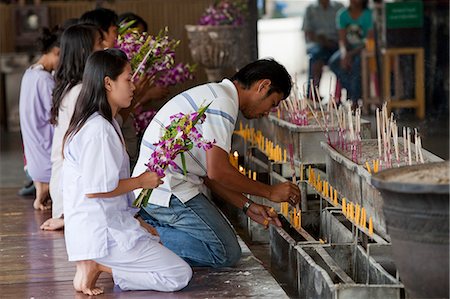 simsearch:862-03713799,k - Bangkok, Thailand. Praying at a buddhist temple Stock Photo - Rights-Managed, Code: 862-03713800