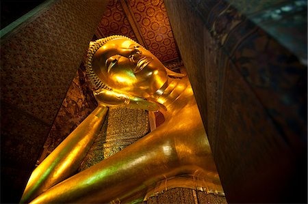 reclining figure - Bangkok, Thailand. The reclining Buddha in Wat Pho. 46 m long and 15 m high gilded Stock Photo - Rights-Managed, Code: 862-03713831