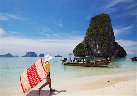 paradise scene - Woman walking on Hat Tham Phra Nang beach, Railay, Krabi Province, Thailan. Stock Photo - Rights-Managed, Code: 862-03713868