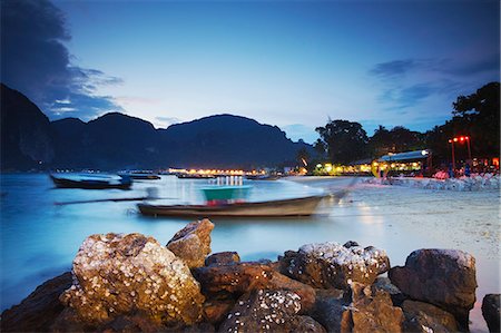 exotic scenes - Long tail boats on Ao Ton Sai beach at dusk, Ko Phi Phi Don, Thailand Stock Photo - Rights-Managed, Code: 862-03713876