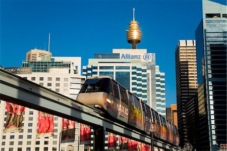 simsearch:841-03032075,k - Australia, New South Wales, Sydney.  Monorail at Darling Harbour with the city skyline beyond. Stock Photo - Rights-Managed, Code: 862-03736184