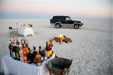 salt plains of africa - Botswana, Makgadikgadi. A romantic dinner for two is set up at sunset on the empty Makgadikgadi saltpans. Stock Photo - Rights-Managed, Code: 862-03736365