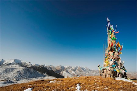 China, Sichuan and Gansu Province, Langmusi town, Tibetan prayer flags in the mountains Stock Photo - Rights-Managed, Code: 862-03736491