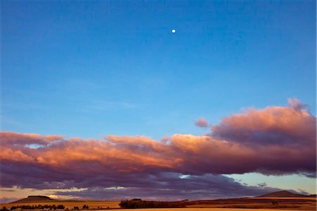 Kenya,Timau. Last light over rolling farmland at Timau with a full moon high in the sky. Stock Photo - Rights-Managed, Code: 862-03736774