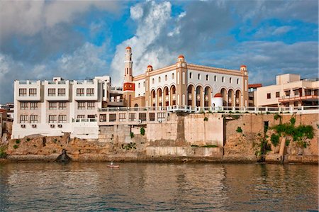 Kenya, Mombasa. Modern buildings and a mosque along the water front of the old dhow harbour in Mombasa. Stock Photo - Rights-Managed, Code: 862-03736790