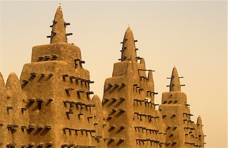 simsearch:862-03731838,k - Mali, Djenne. The celebrated Mosque of Djenne, or Grande Mosquee,  with towers topped by ostrich eggs. Stock Photo - Rights-Managed, Code: 862-03736922