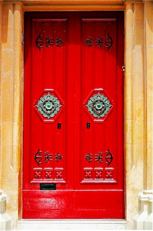 Malta, Mdina, colourful red door and detail in the side streets of Mdina. Fotografie stock - Rights-Managed, Codice: 862-03736952