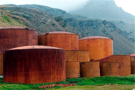 South Georgia and the South Sandwich Islands, South Georgia, Cumberland Bay, Grytviken. Whale blubber oil storage tanks. Stock Photo - Rights-Managed, Code: 862-03737109