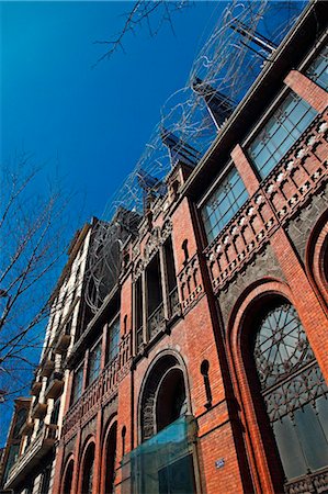 Spain, Cataluna, Barcelona, Eixample, The wire sculpture 'Cloud and Chair' by Antoni Tapies, the facade of the Fundacio Tapies. Stock Photo - Rights-Managed, Code: 862-03737162