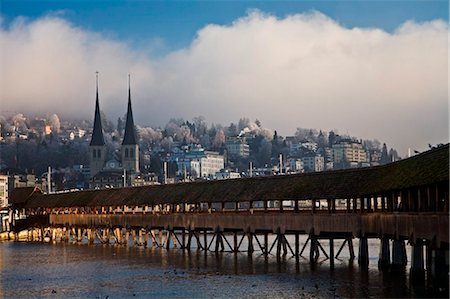 Switzerland, Lucerne, Luzern, General view of the town of Lucerne with the Reuss River and the Kappelbrucke (Chapel Bridge) Stock Photo - Rights-Managed, Code: 862-03737185