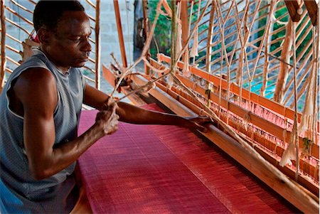 Tanzania, Zanzibar. A skilled weaver at his wooden loom. Stock Photo - Rights-Managed, Code: 862-03737289