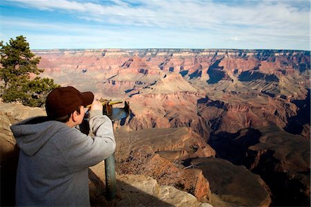 simsearch:862-06677523,k - United States; Arizona; Grand Canyon. A boy uses a telescope to view the Grand Canyon from the South rim Stock Photo - Rights-Managed, Code: 862-03737405