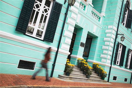 simsearch:862-03731030,k - Woman walking past Museum of Taipa and Coloane History, Taipa Village, Taipa, Macau, Chin. Stock Photo - Rights-Managed, Code: 862-03731038