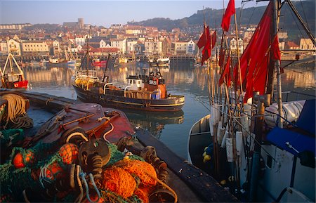 english ports - Fishing boats in the Harbour, Whitby, North Yorkshire, England Stock Photo - Rights-Managed, Code: 862-03731154